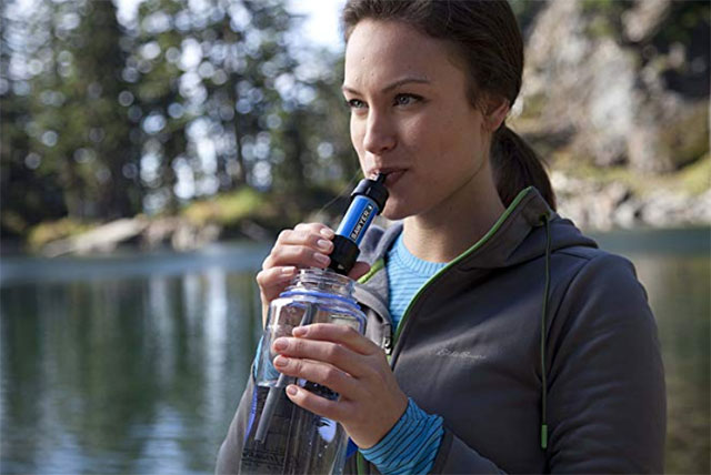 A woman who uses sawyer mini water filter